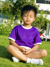 Young boy meditating small